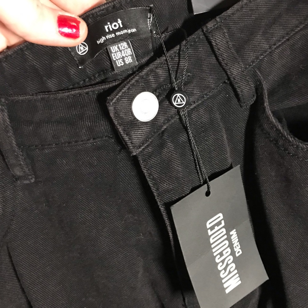 Misguided black busted knee mom jeans